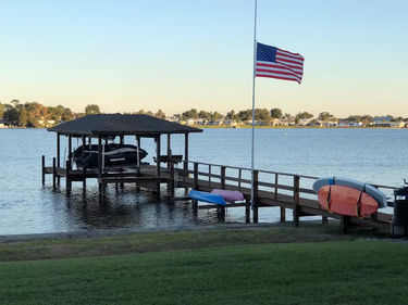 Anodized aluminum flagpole side mount with a 3-inch diameter by Atlantic Flag & Pole Inc.